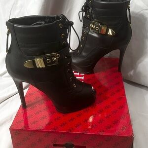 Women’s Guess Black Lace-Up Heeled Boots